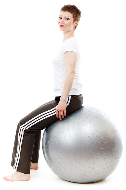 Woman on Exercise Ball